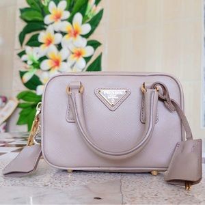 Prada saffiano lux mini bauletto beige 




 5.5" x 3.75" x 1.8"